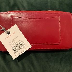 Lucy red leather wallet tags on